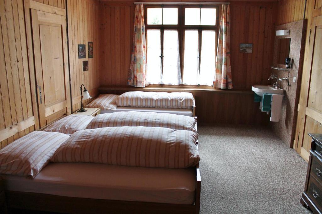 Hotel Posthaus Urigen Unterschachen Номер фото